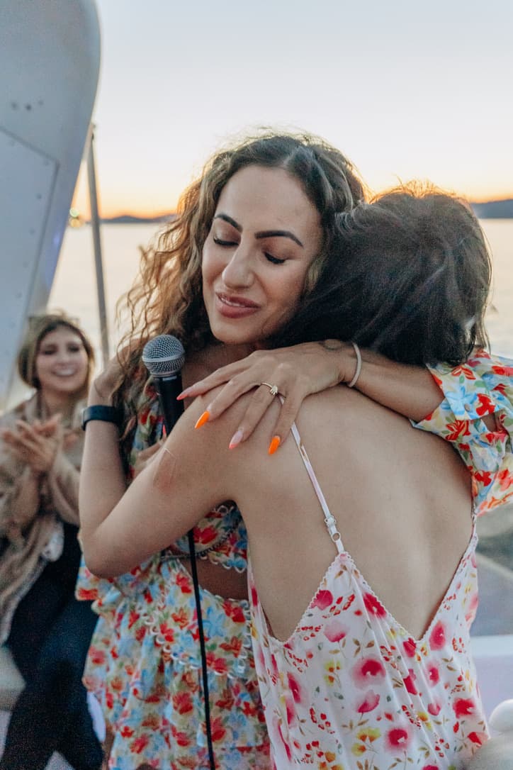 An embrace after a room activation at sunset