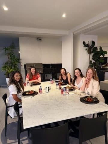 A shared meal at the long table