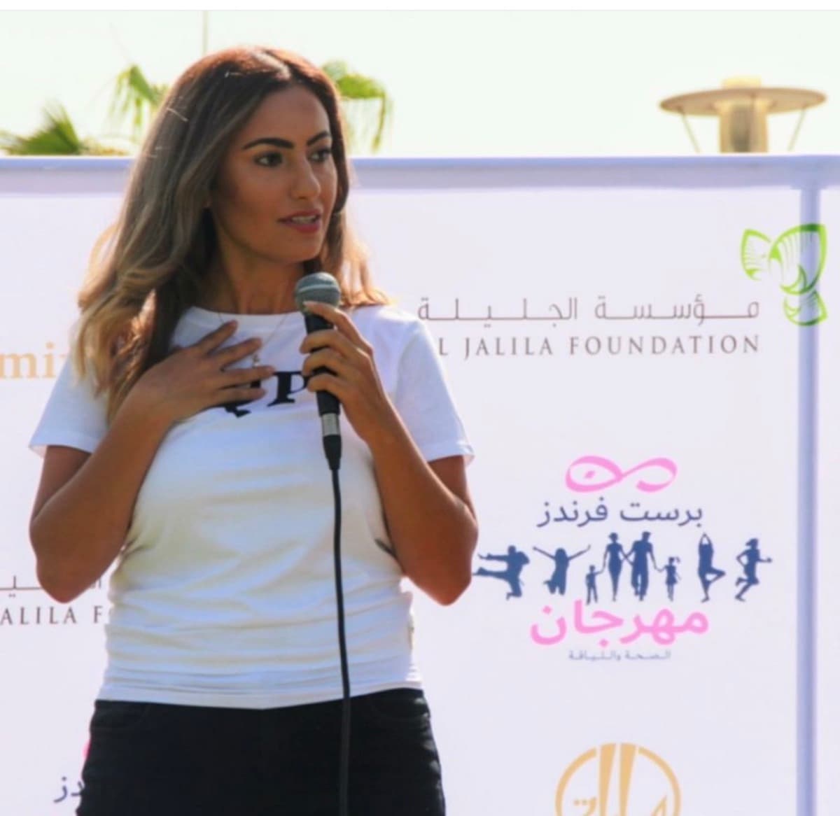 Hevi Serdar speaking at an Al Jalila Foundation event